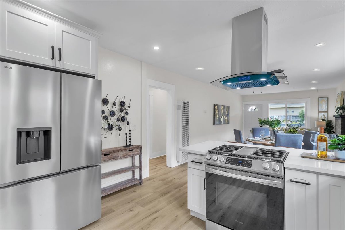 Renovated kitchen interior of the Oakland investment property — featuring modern cabinetry, updated appliances, and clean finishes after acquisition and transformation.